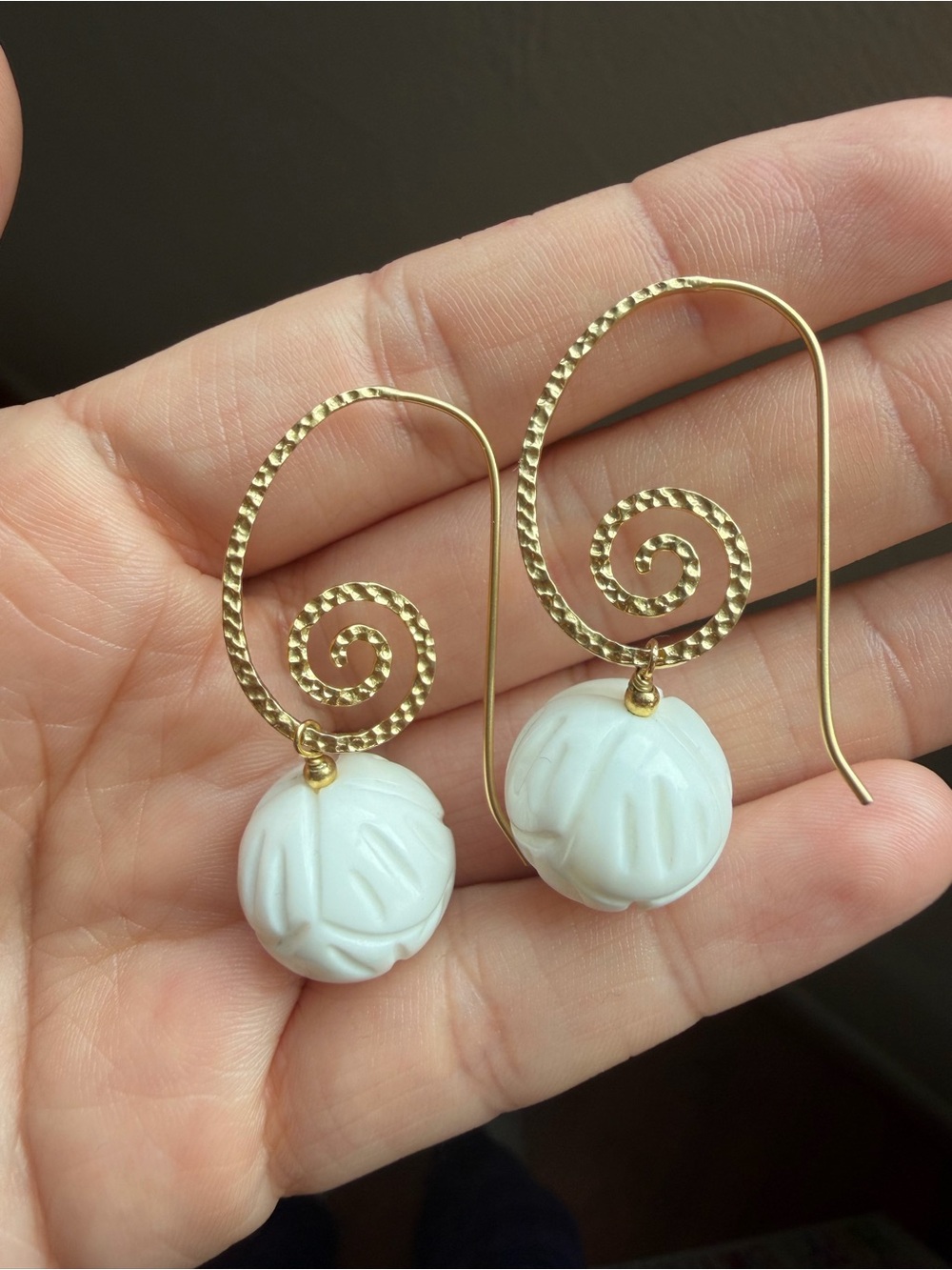 Gold tone Spiral Earrings with Carved White Beads